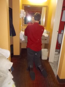 050215 Nate kneels to use mirror