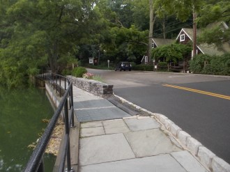 072715 New stone wall at millpond
