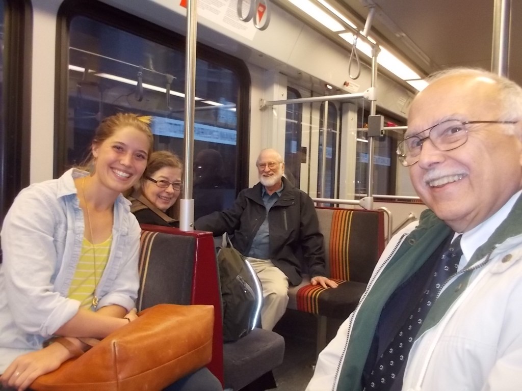 Anna, Janet, Tom, and John in the light rail car