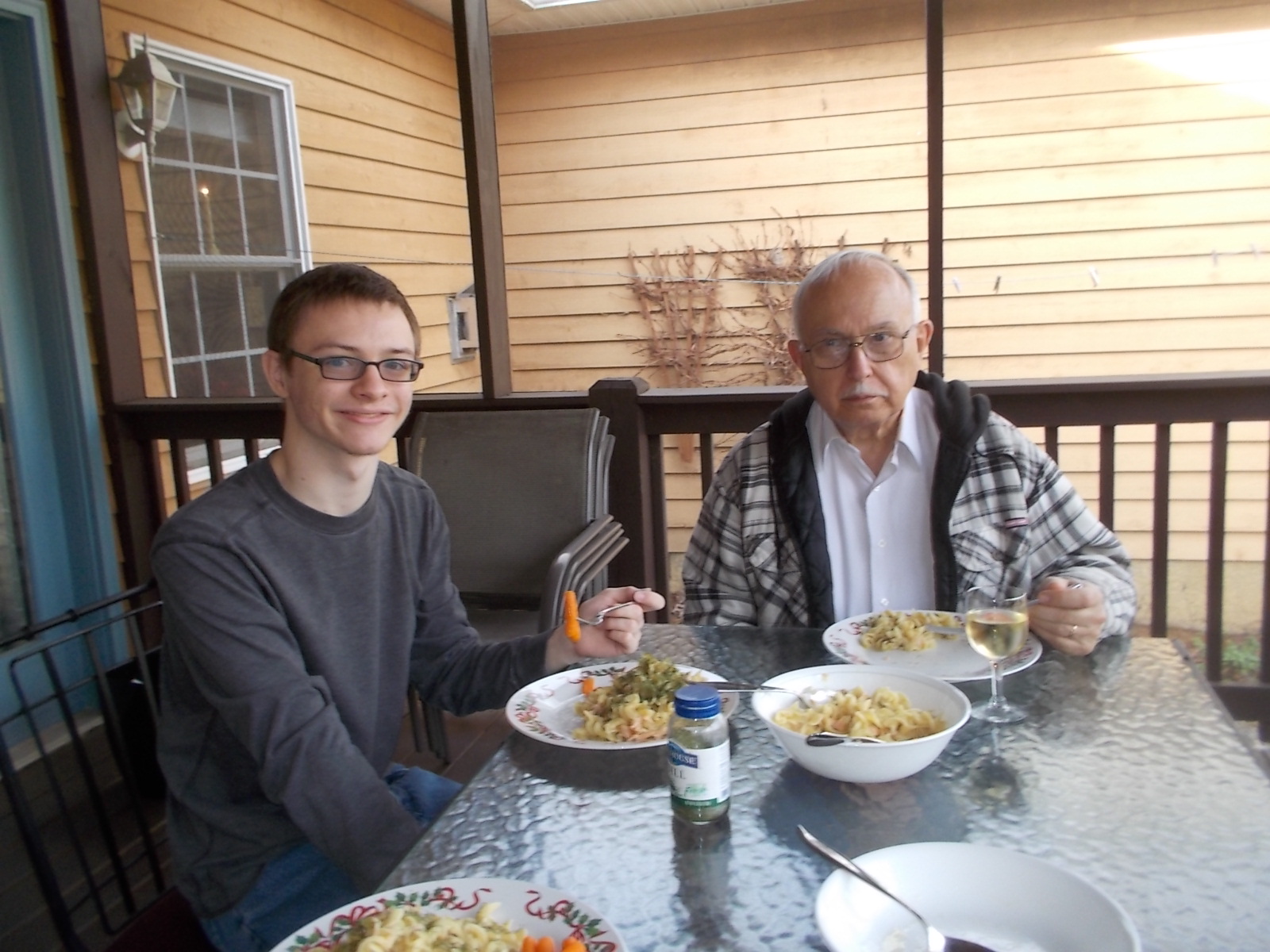 122615 D JC eating on porch day after Christmas.JPG