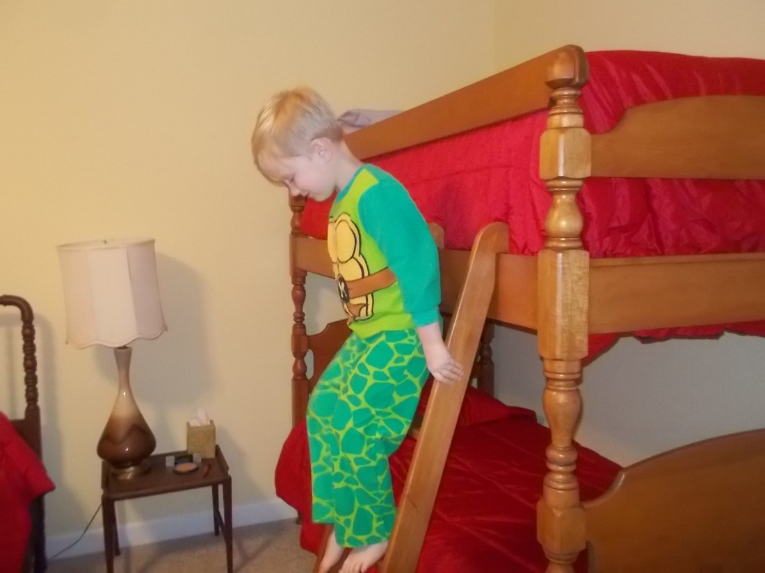 041716 Logan changes his mind about the top bunk.JPG