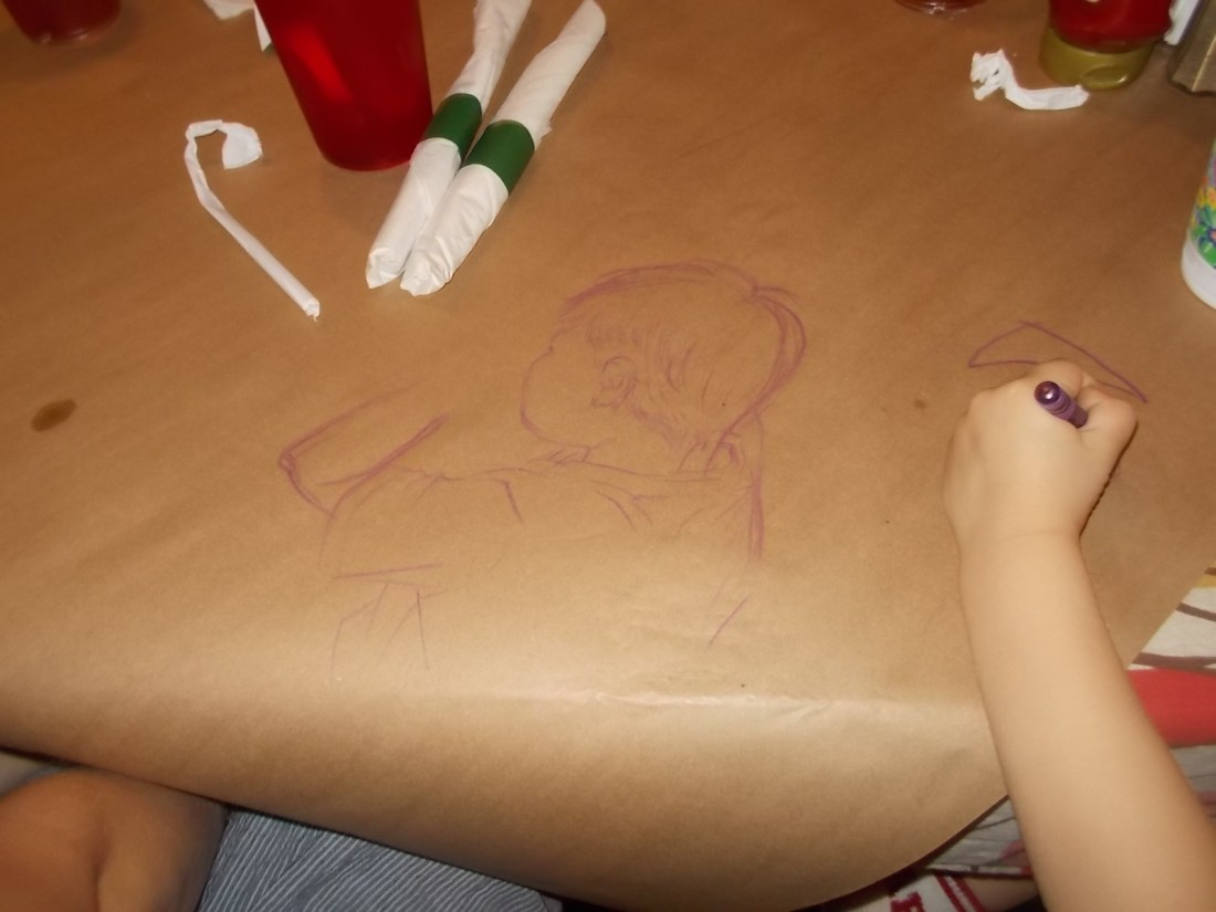 052716 Courtney sketched Logan's head.JPG