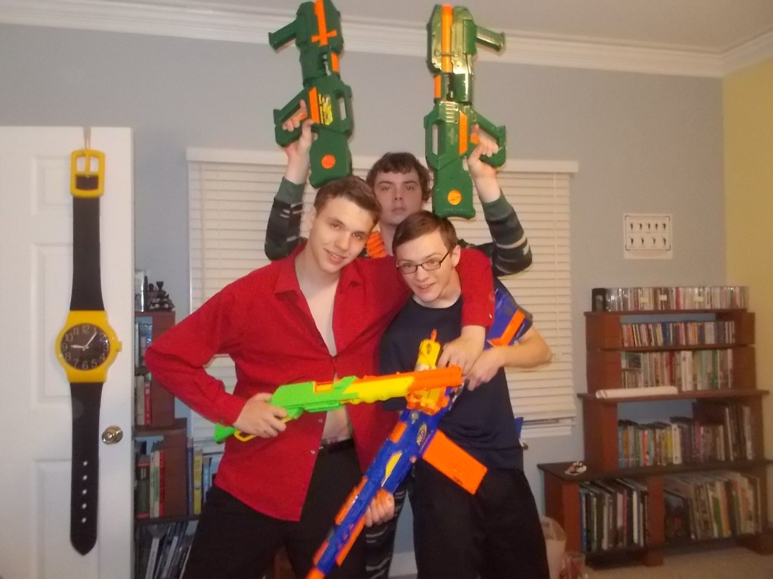 062916 N Dennis D pose with guns.JPG