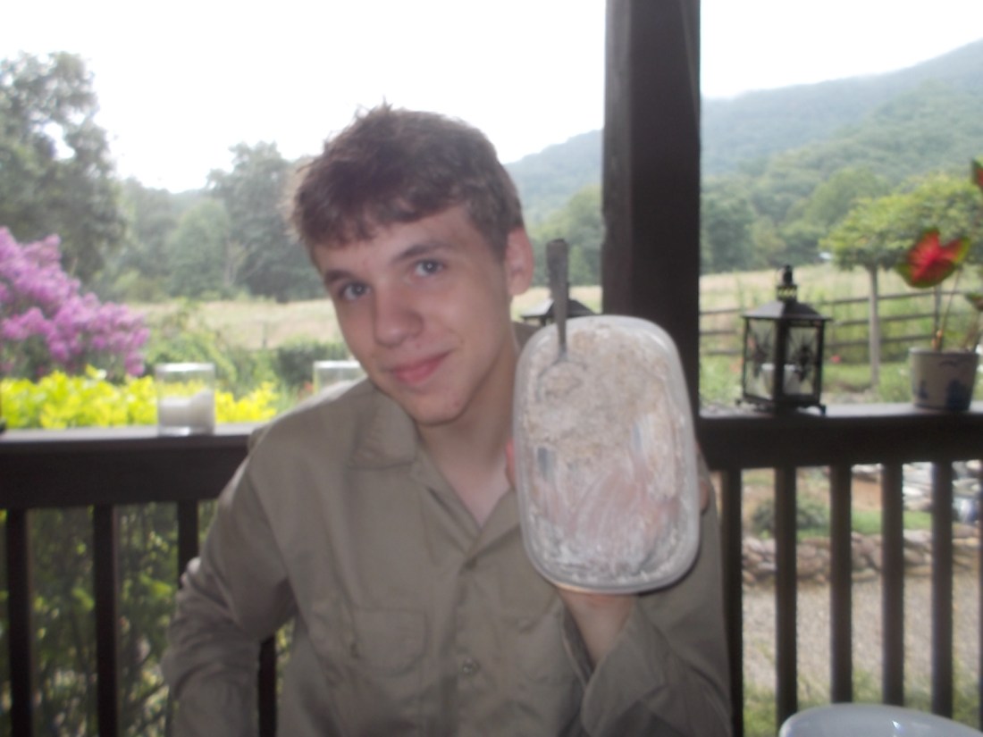 081416 Nate shows serving dish of summer oatmeal.jpg