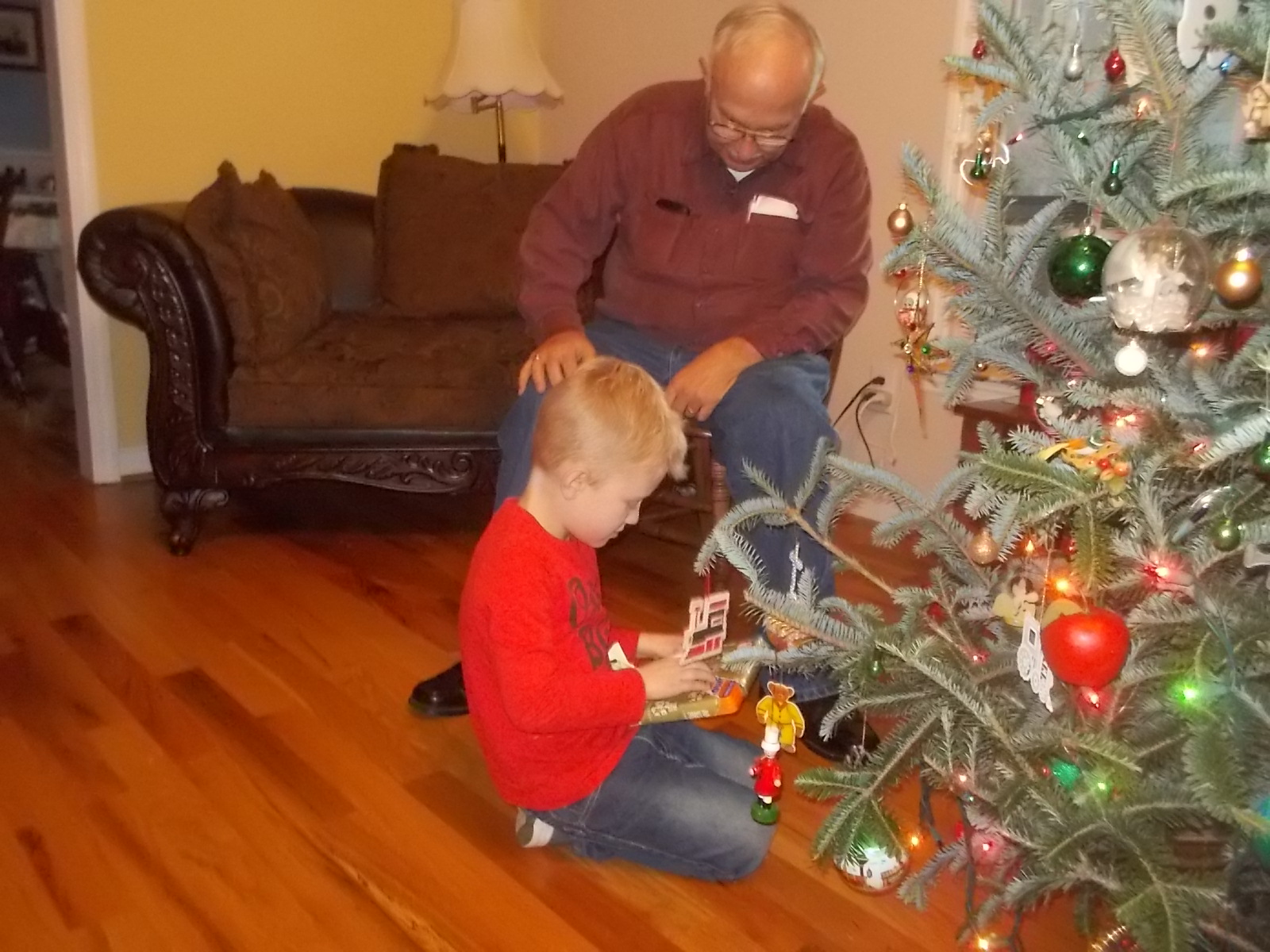 122916 Logan opens gift.JPG