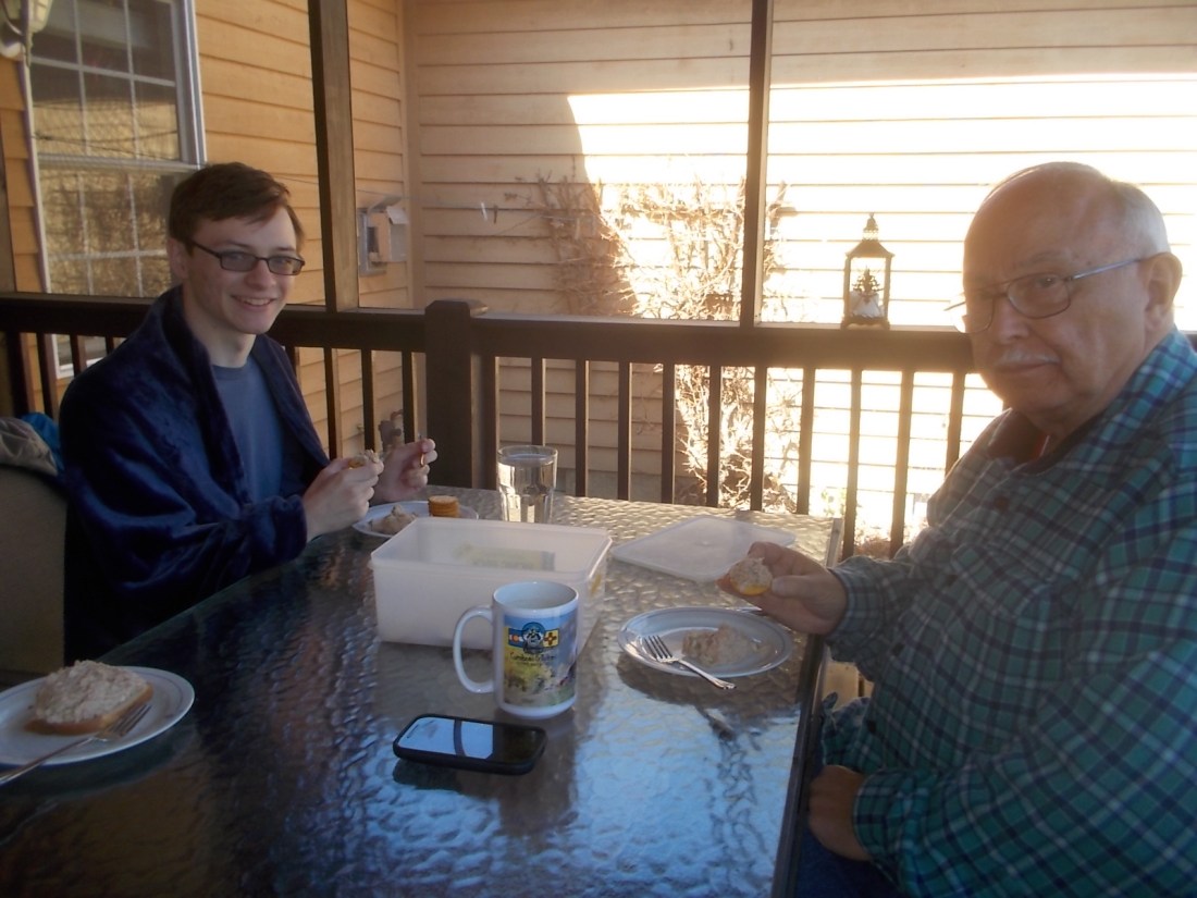 030917 D JC eating on porch.jpg