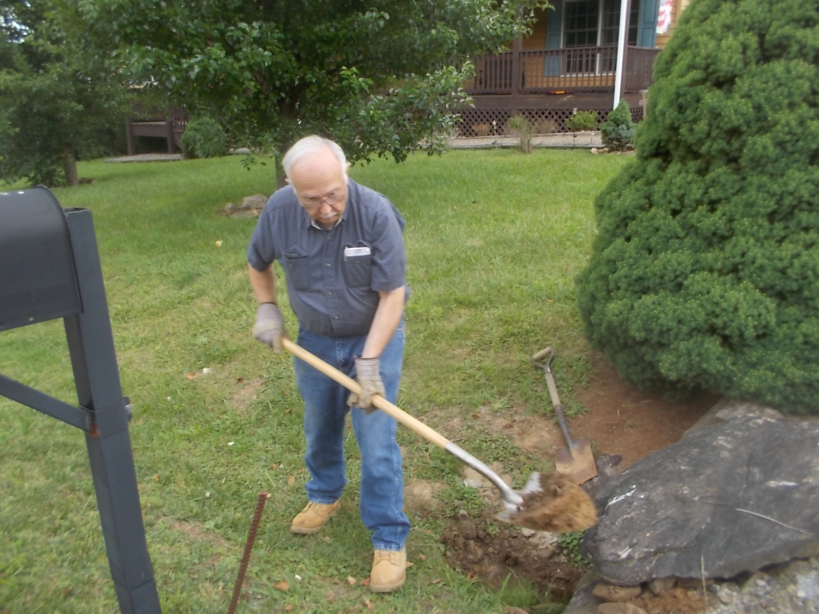 060817 John digs out pipe.JPG