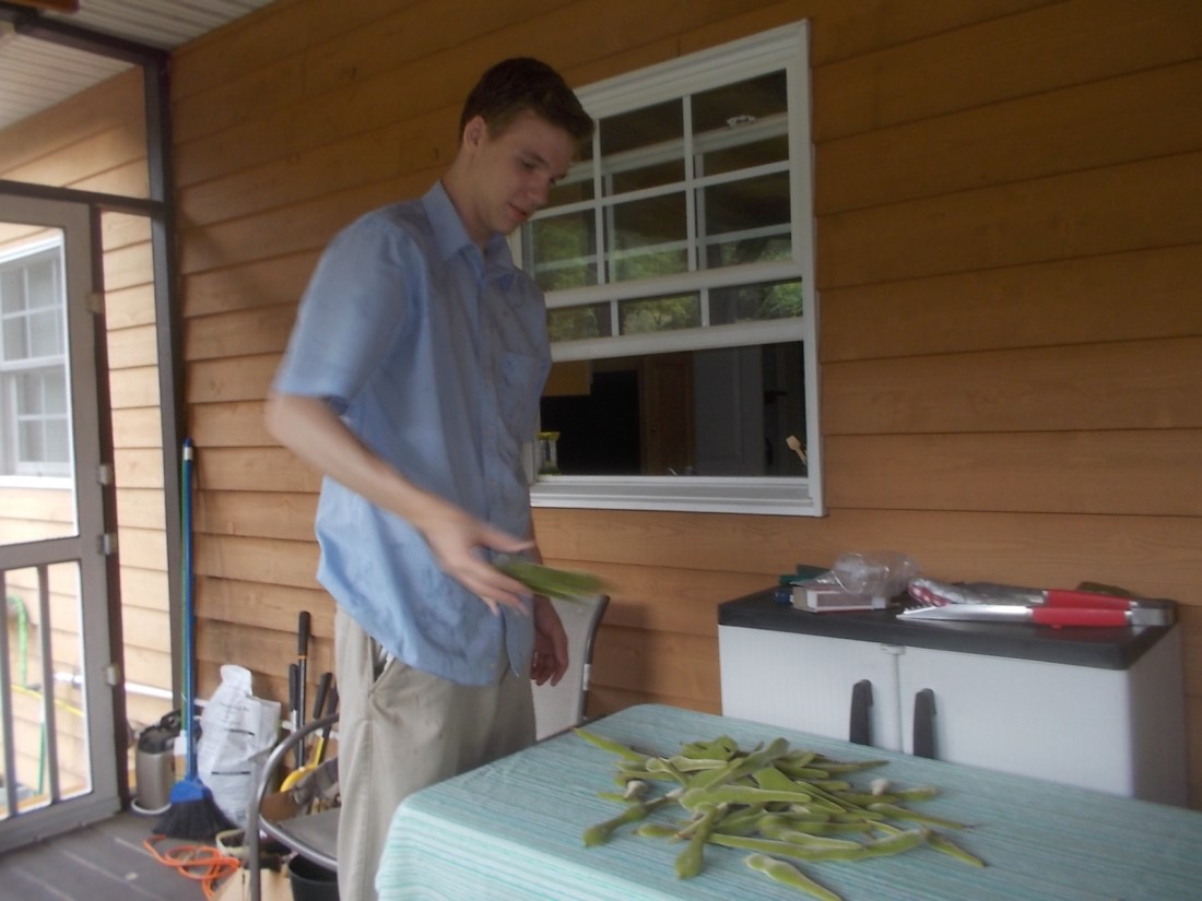 080717 N taking pods out of pockets.jpg