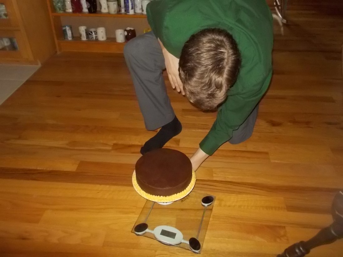 082117 Eclipse Nate weighs cake.jpg