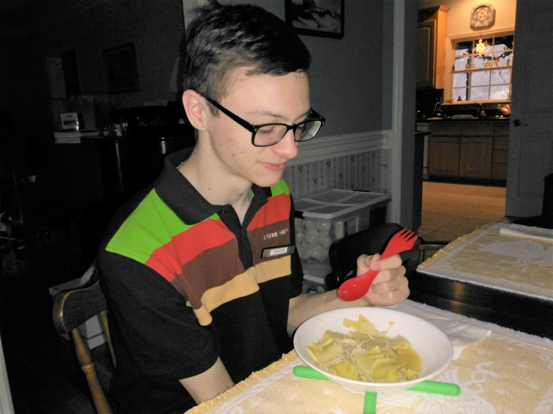 121617 David eats with a spork.jpg