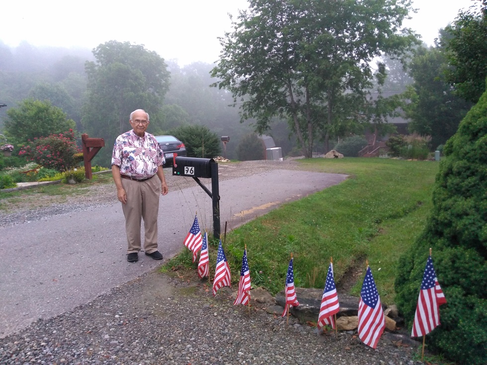 061418 John at our mailbox on Flag Day.jpg