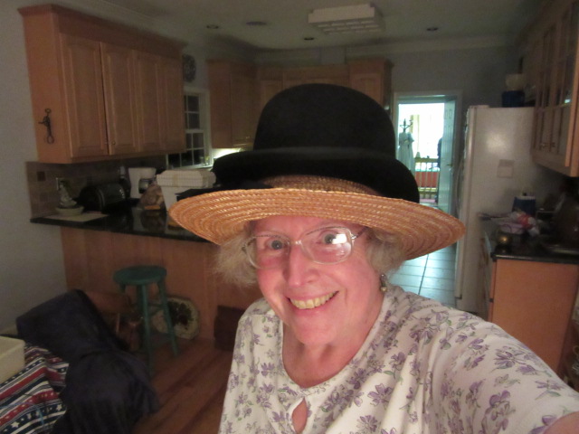 062618 Carrying hats in the house.JPG