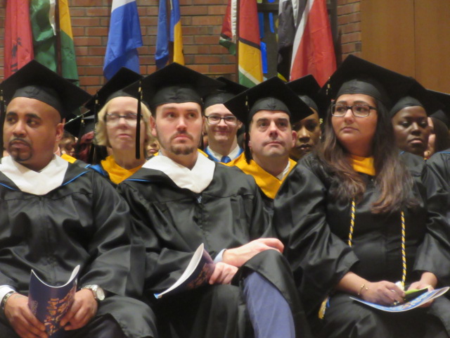 121618 David graduates  (2) among classmates.JPG