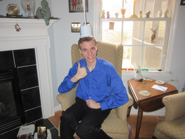 122518 Nate wears toilet brush proudly.JPG