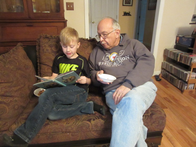 030719 Logan reads to John.JPG
